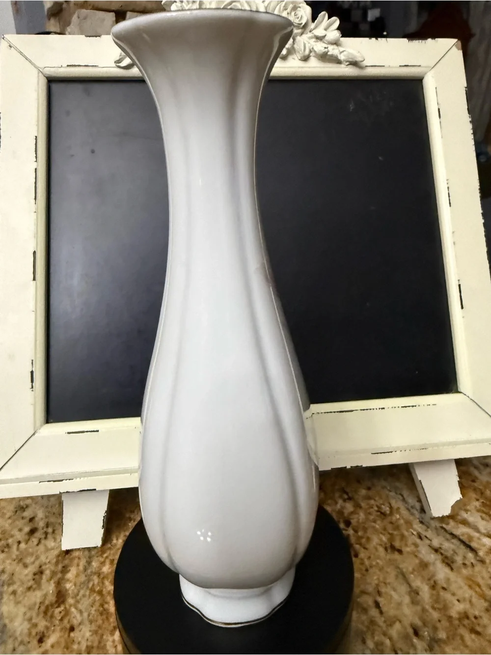 Delicate White Vase with Pastel Pink and Blue Floral Motif